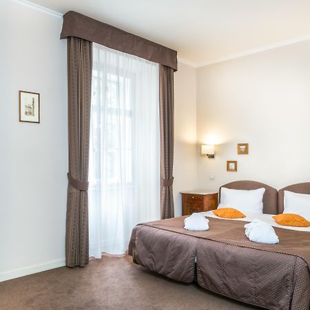 Hotel Bookquet Praga Exterior foto A room at the hotel